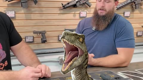 Choose a Velociraptor Hunting Handgun