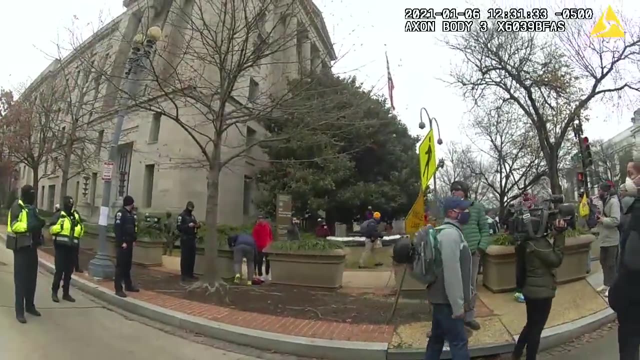 J6 evidence Keep the march going as the officer waves them to the Capitol