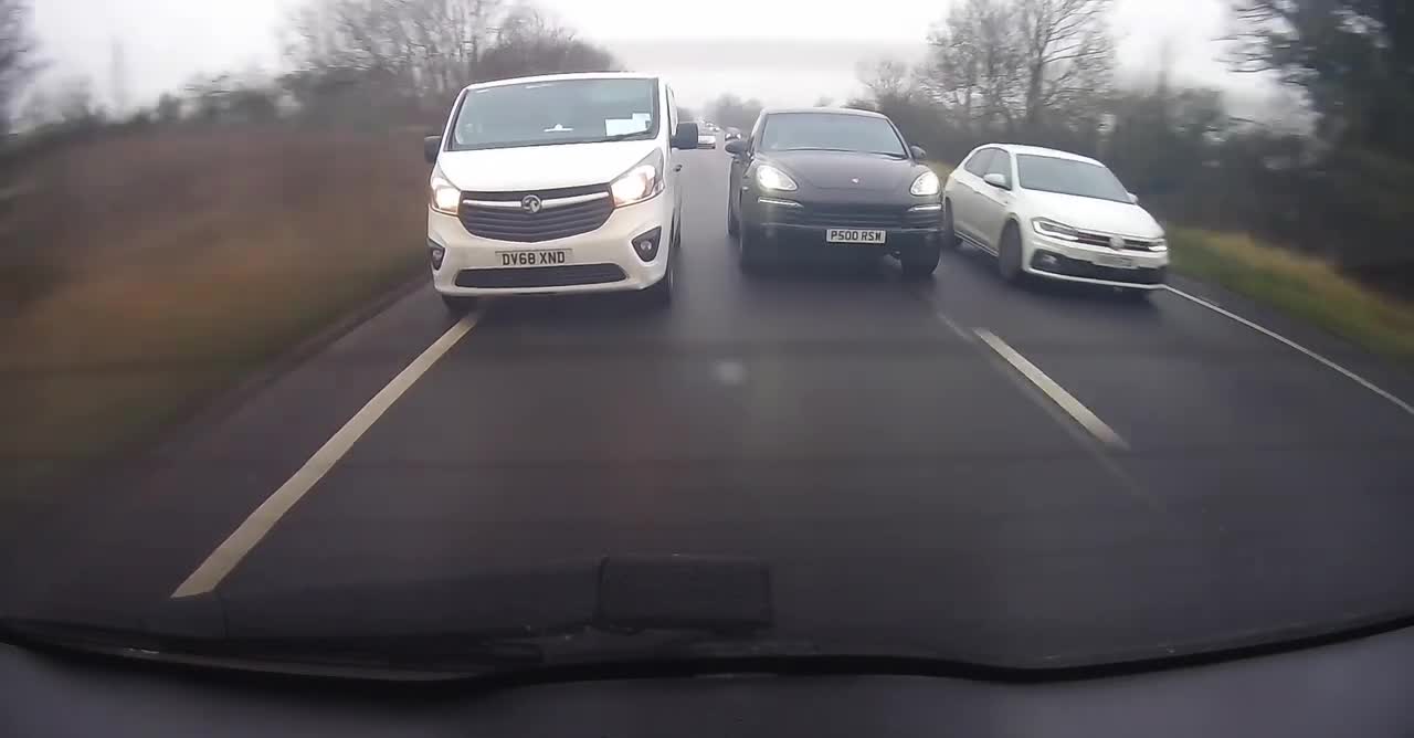 Porsche and Van Driver Try to Overtake Each Other and Switch Lanes Multiple Times