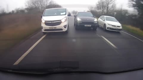 Porsche and Van Driver Try to Overtake Each Other and Switch Lanes Multiple Times