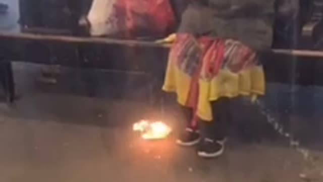 Woman sits on bench and starts small fire in subway station to stay warm