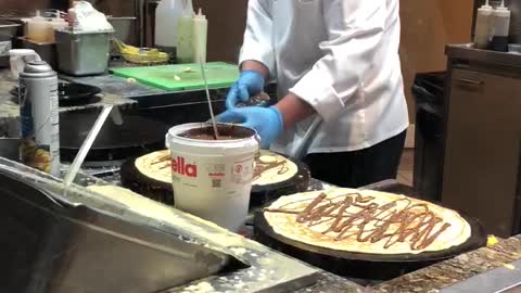 Watching them make a crepe- NY NY