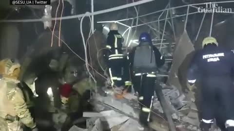 Survivors pulled from rubble after Russian strikes hit Kyiv neighbourhood