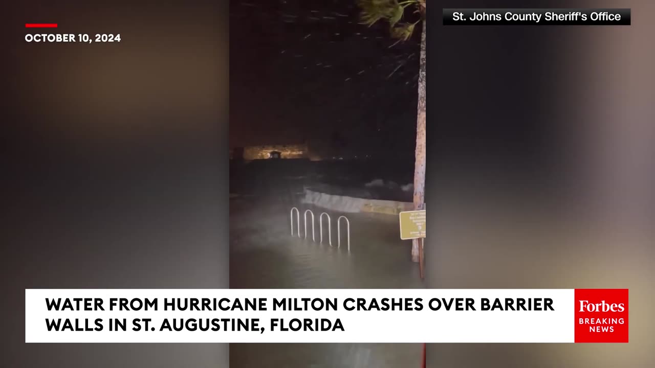 Water From Hurricane Milton Crashes Over Barrier Walls In St. Augustine, Florida