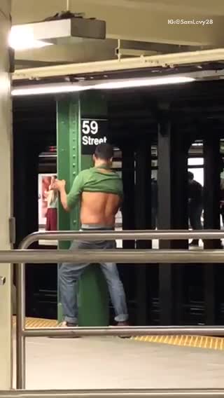 Guy 59 street humping green beam pole subway station platform