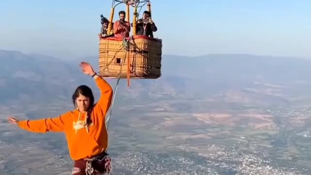 Girl walking a rope in tha sky || amazing video || must watch it stunt ||