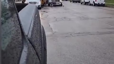 car hits the back of school bus