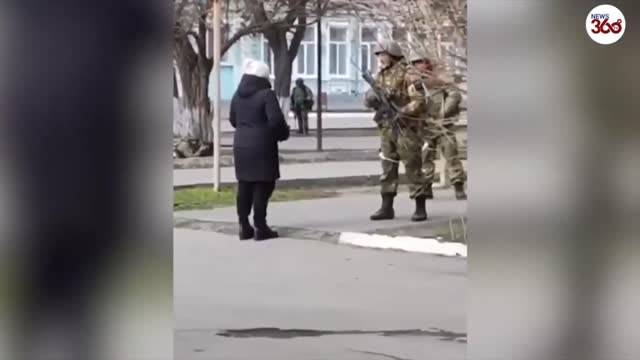 SHOCKING : A brave Ukrenian woman in front of a Russian soldier