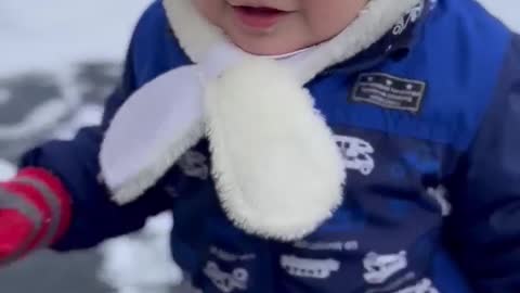 Japanese Child playing in the snow for the first time