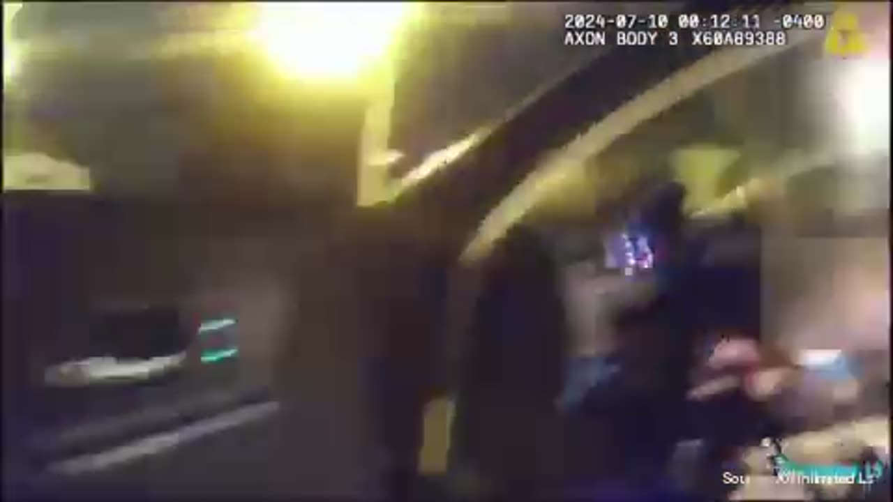 WATCH: Police Officer Fatally Shoots Suspect While Clinging For Dear Life On Fleeing Car
