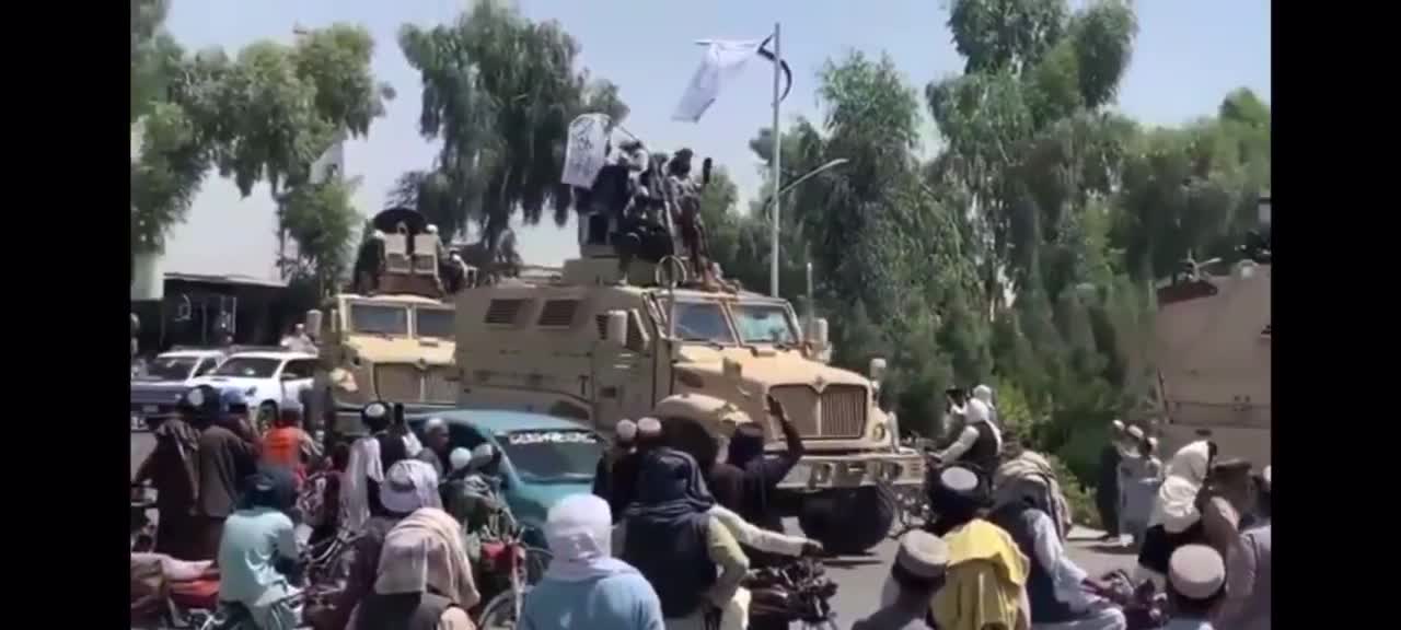 Taliban in US Uniforms Throw Military Victory Parade Riding in US Military Equipment with US Guns