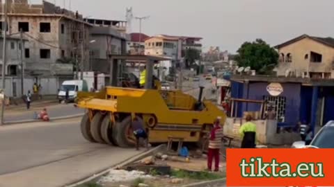 See how a child is ignored in front of a bulldozer