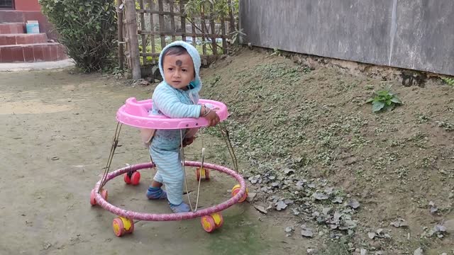 Baby boy first step his Walker//