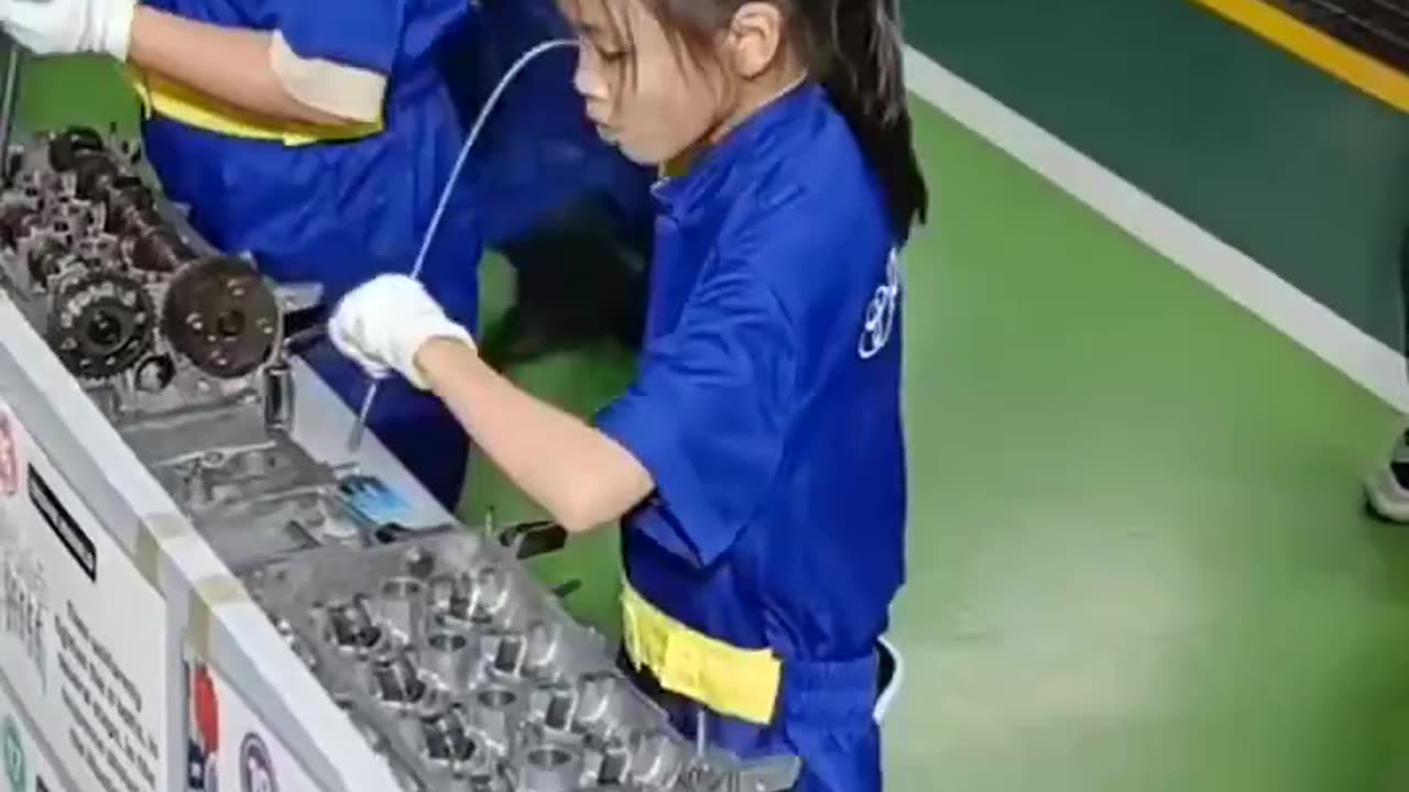 School kids In Japan learning car maintenance