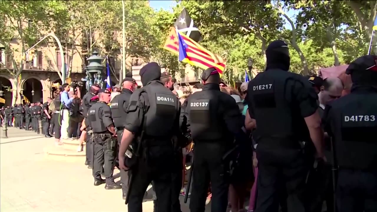 Wanted Catalan separatist evades capture after speech in Spain