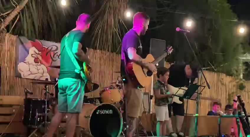 roosters on the rock