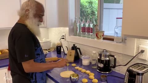 Sadhguru cooking a meal