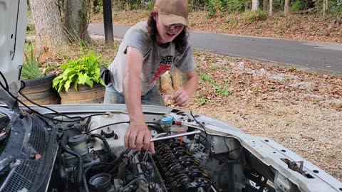 Paul Removing A Honda Civic Spark Plug