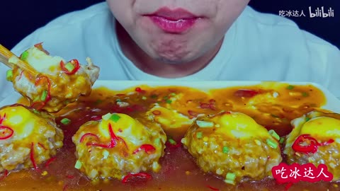Eat flying saucer shaped quail egg yolk meatballs and listen to a different chewing sound