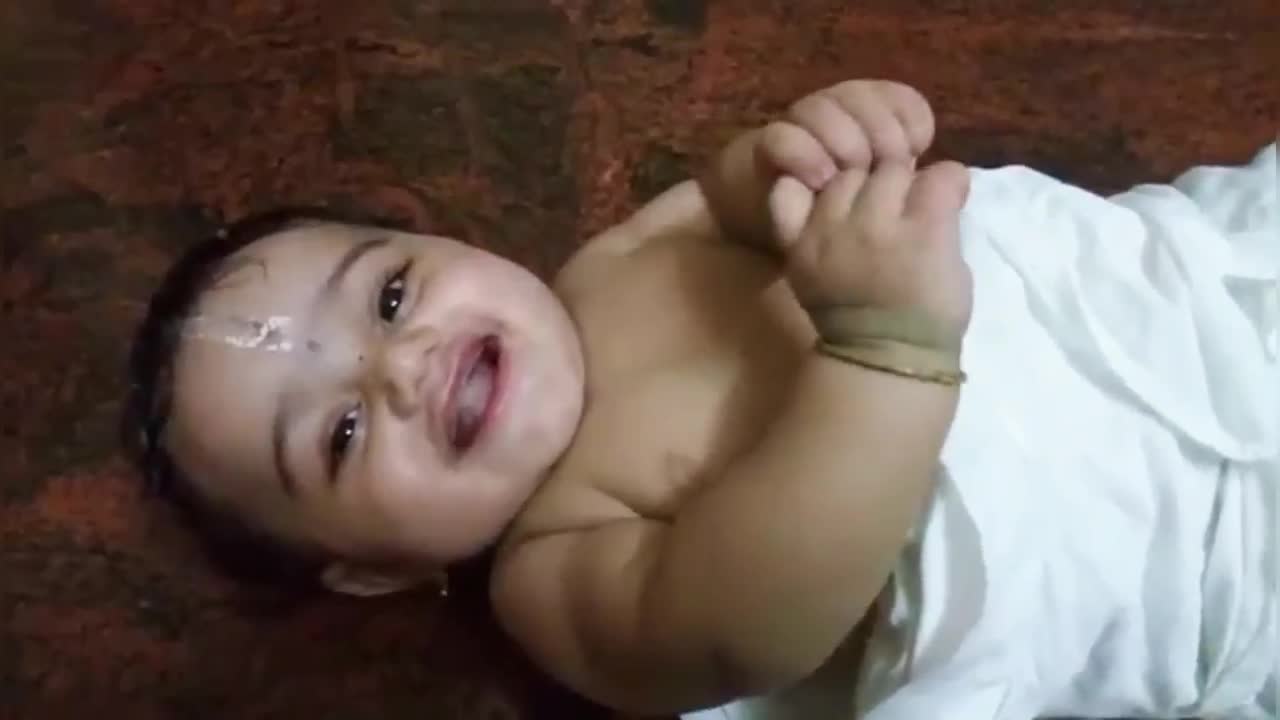 Cute indian beby laughing