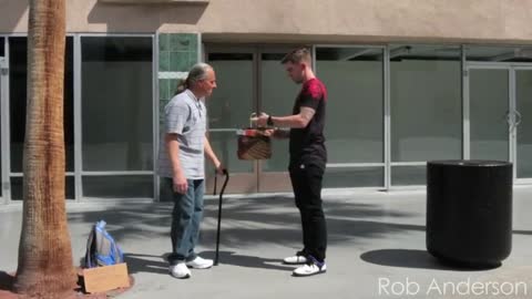 Magician shocks homeless man after throwing away pizza