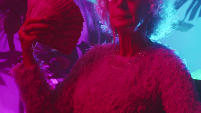 video-of-elderly-woman-holding-money