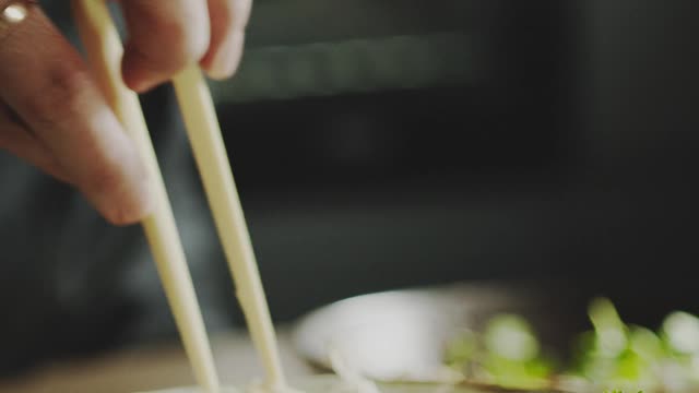 A Chef Checking The Noodles Of Bowl Dish