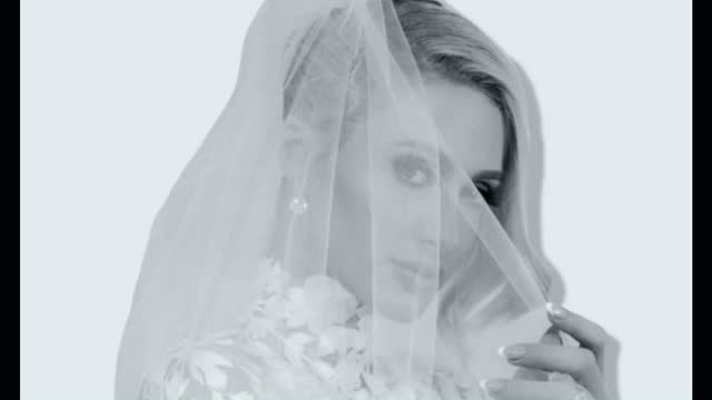 PARIS HILTON IS A BLUSHING BRIDE
