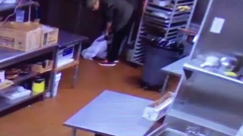 Collab copyright protection - guy runs slips with two bags at work