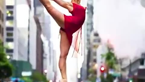 Ballerina balancing on a champagne bottle!