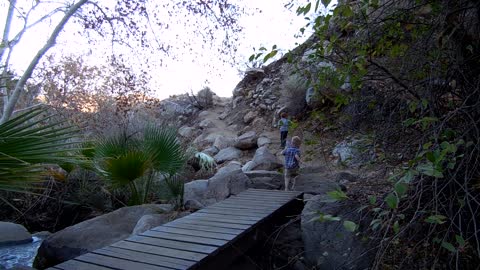 Overly Cautious Kid Crosses Small Bridge As If It Was Niagra Falls