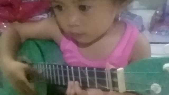 Bocil main gitar