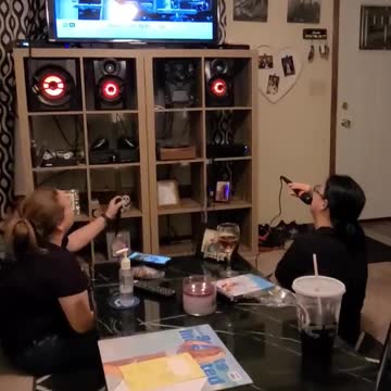 Amanda & Angela Playing Sing Star