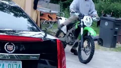 Dog Hops Onto Motorcycle for Ride