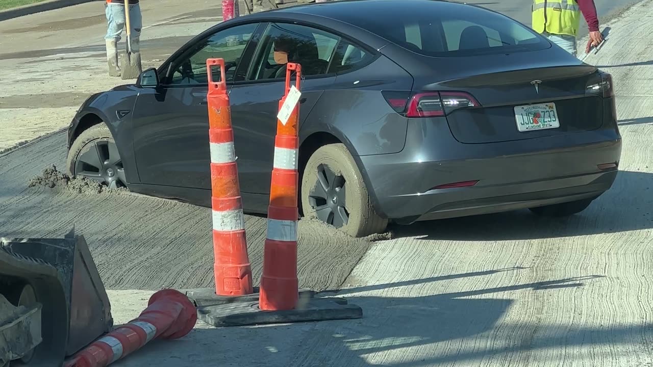 Car Stuck In Wet Concrete