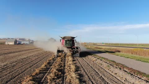 Low in front of combine