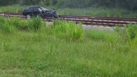 Train Hits Car on Tracks in Florida