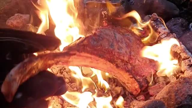 Grill the steaks over a wood or charcoal fire that is quite hot.