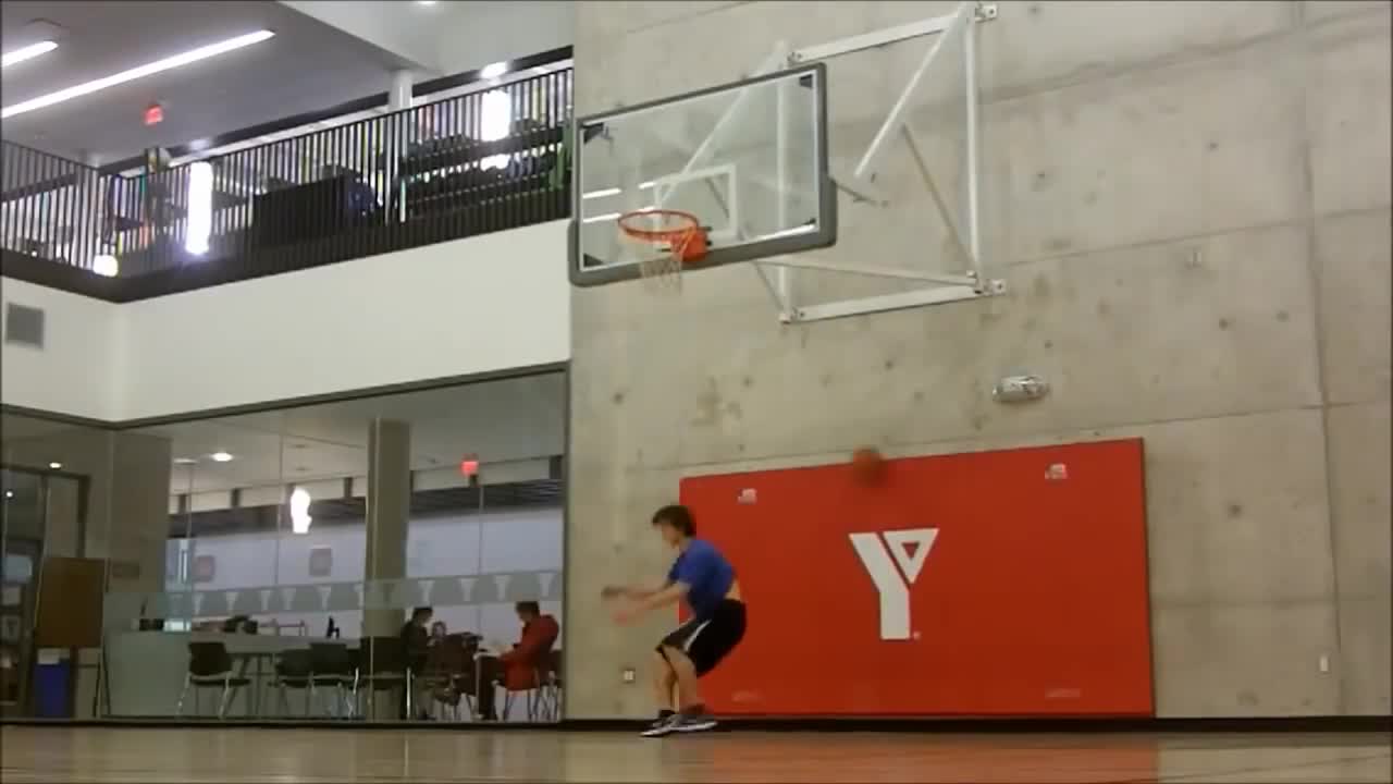 Incredible! Kid dunking a baskeball at 5'8 after months of training.