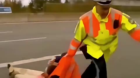 German Police Handling Climate Hoax Protestor