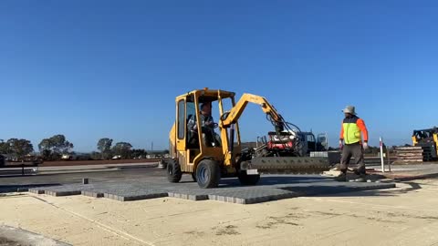 This machine sucks all the joy out of paving