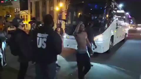 Protester hold up traffic.