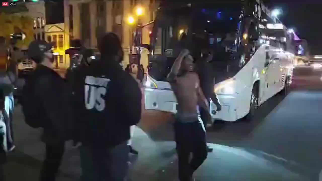 Protester hold up traffic.