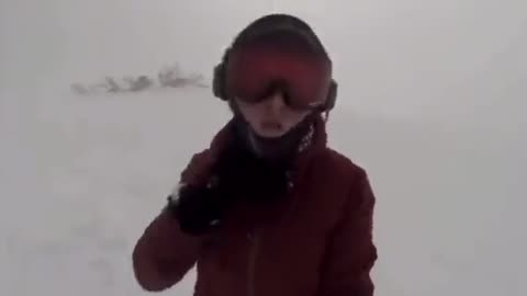 Snowboarder Doesn't See Bear Chasing Her