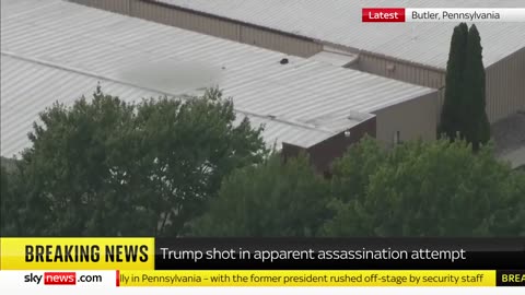 Footage appears to show body on roof after Trump shot