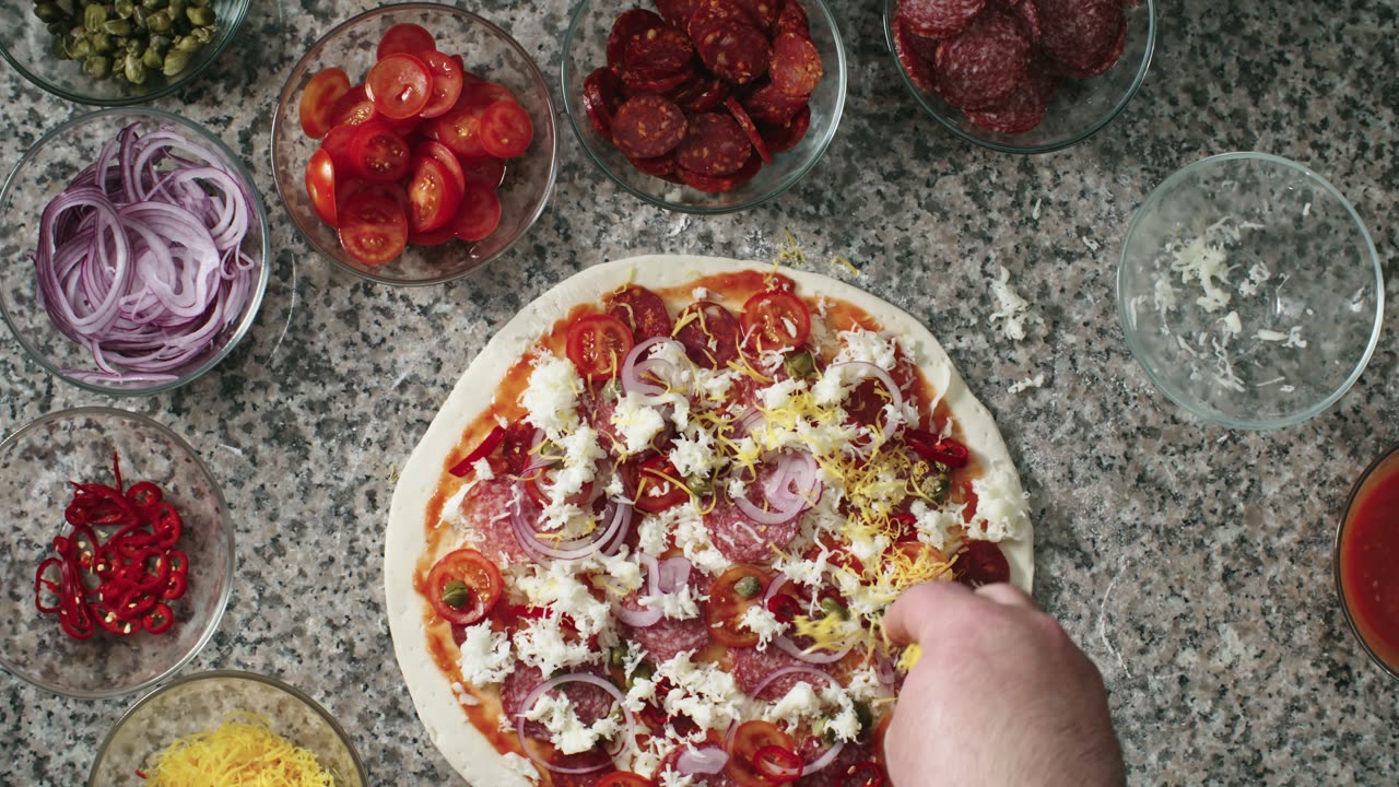 A Man Making a Pizza
