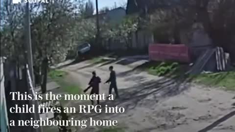 Ukrainian children find a loaded rocket launcher in the street.