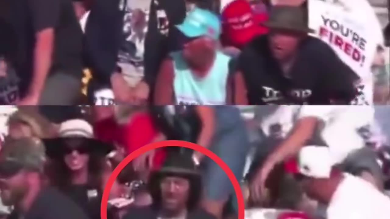 Notice the man in the black hat is the only one who doesn’t move while shots are being fired.