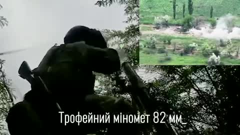 MORTARMEN OF THE MTR OF UKRAINE PILE ON FROM A CAPTURED 82-MM MORTAR