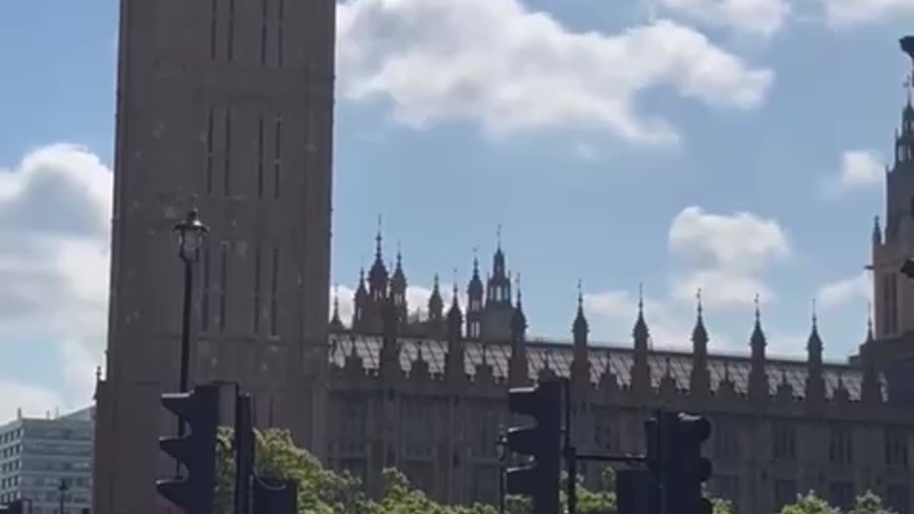 Fake King "Sausage-Fingers" Charles (his double/masked actor) gets some flak in London